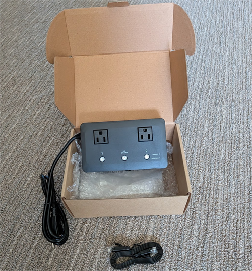 The MSNSwitch2 UIS722t and accessories in its shipping box.