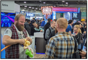 KubeCon attendees meet with vendors on the conference show floor